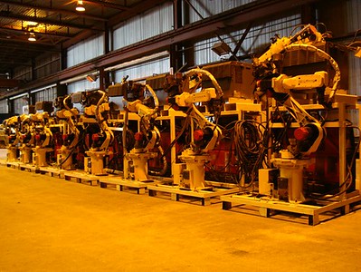 Fanuc Robots lined up and ready to be installed at a shop located in Grand Rapids. Installation by Industrial Robot systems integrator